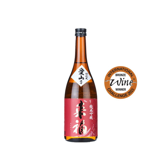 Front view of Raifuku Junmai Ginjo Aiyama bottle featuring the iconic purple-themed label and flower yeast branding